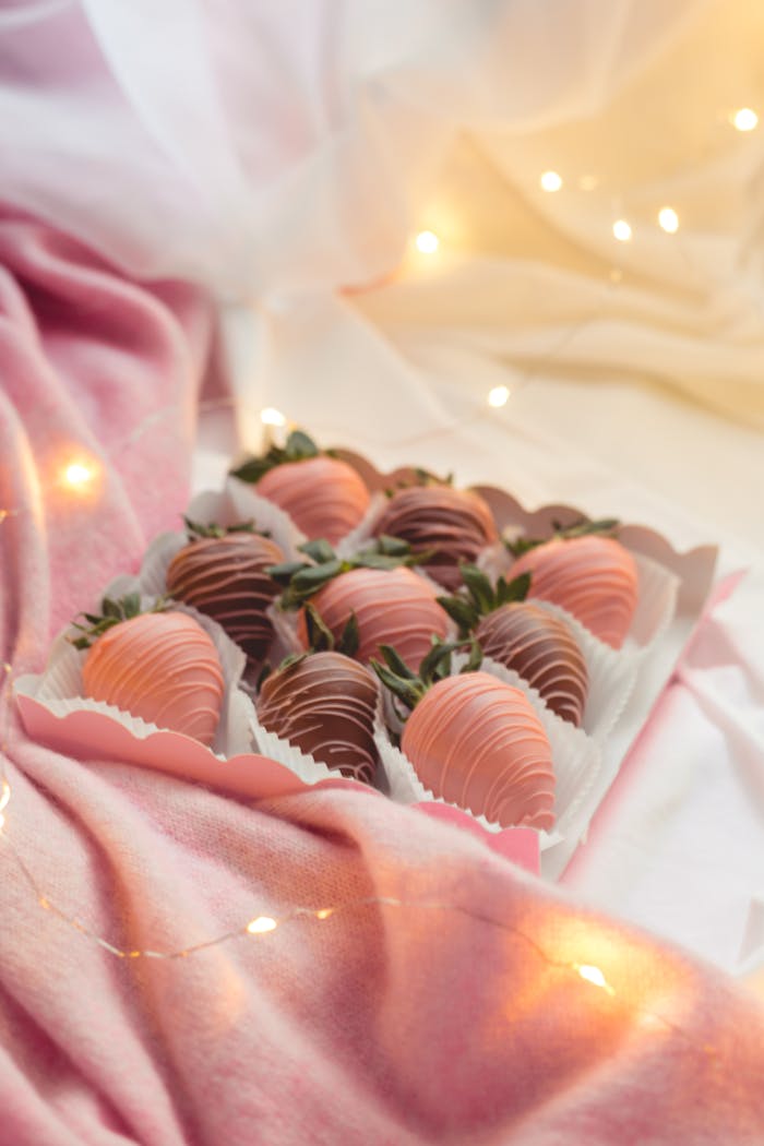 menu-01 Delicious chocolate-covered strawberries elegantly boxed with romantic string lights.